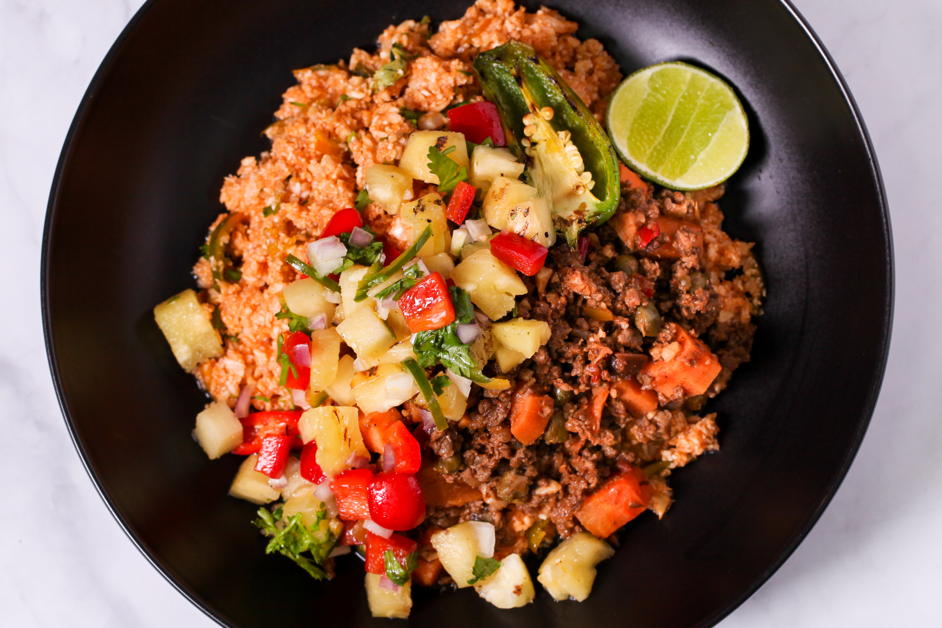 Beef Picadillo with Pineapple Salsa and Mexican cauliflower rice