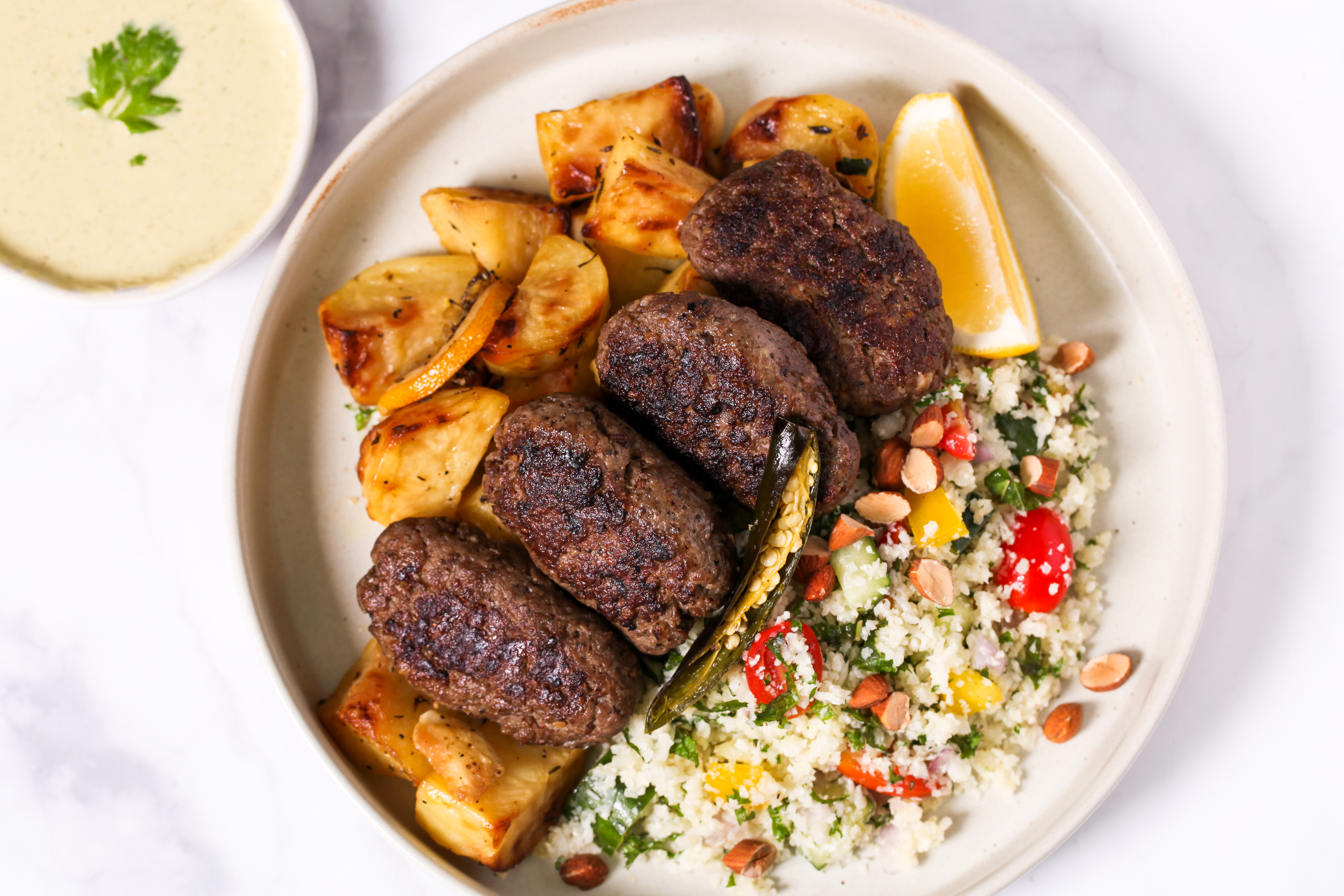 Za'atar Lamb with Cauliflower Tabbouleh & Lime Tahini